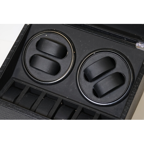 151 - A Large Watch Winder/Storage Box. Comes with a charger, currently running. (18x24x31)