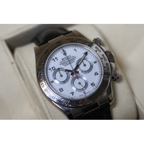 35 - Brand: ROLEX 
 Model Name: DAYTONA 18CT WHITE GOLD
 Reference: 116519
 Movement: Automatic
 Box: Yes... 