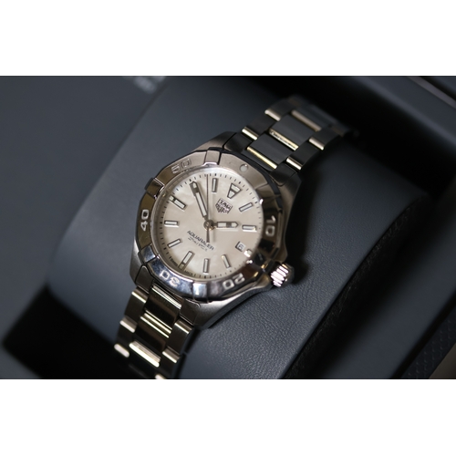 74 - Brand: Tag Heuer
 Model Name: Aquaracer
 Reference: WBD1411
 Complication: Date
 Movement: Quartz
 B... 