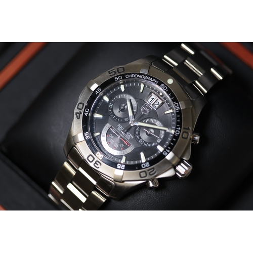 80 - Brand: Tag Heuer
 Model Name: Aquaracer 300M
 Reference: CAF101A
 Complication: Chronograph
 Movemen... 