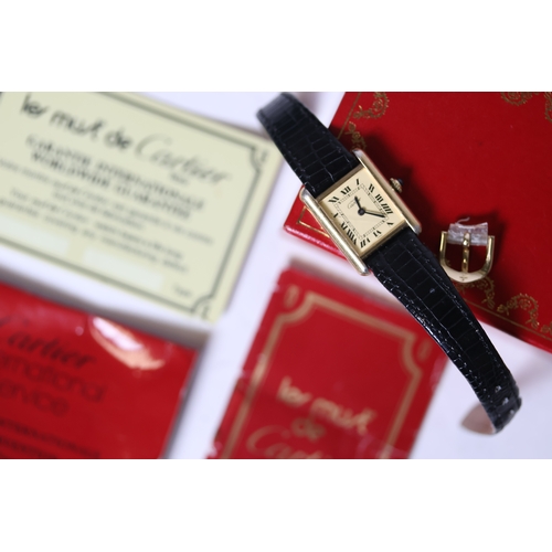 114 - Brand: Must De Cartier
 Model Name: Tank
 Movement: Manual Wind
 Box: Yes
 Papers: Yes
 Year: Undate... 