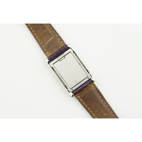 132 - CARTIER TANK BASCULANTE W/ GUARANTEE PAPERS REF. 2386, rectangular dial with hour markers and hands,... 
