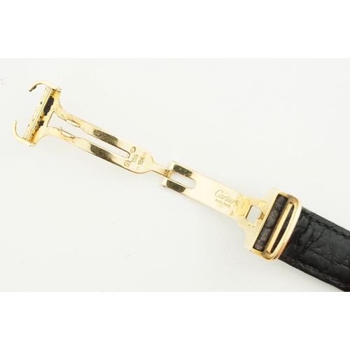 180 - CARTIER TANK AMERICAINE 18CT GOLD REF. W2600951, rectangular guilloche dial with hour markers and ha... 