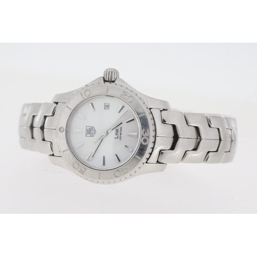 92 - Brand: Ladies Tag Heuer
 Model Name: Link
 Reference: WJ1313-0
 Complication: Date
 Movement: Quartz... 