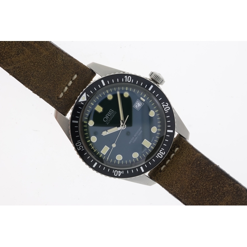 117 - Brand: Oris
Model Name: Diver 65
Movement: Automatic
Box: Yes
Papers: Yes
Dial shape: Circular
Dial ... 