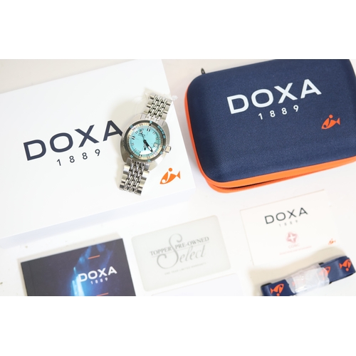 129 - Brand: Doxa
 Model Name: Sub 300
 Reference: 821.10.241.10
 Complication: Date
 Movement: Automatic
... 