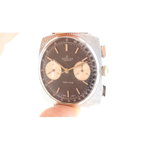 124 - Brand: Breitling
 Model Name: Top Time 
 Reference: 2007
 Movement: Manual Wind
 Dial shape: Circula... 