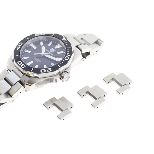 77 - Brand: Tag Heuer
 Model Name: Aquaracer 
 Reference: WAY111A
 Movement: Quartz
 Dial shape: Circular... 