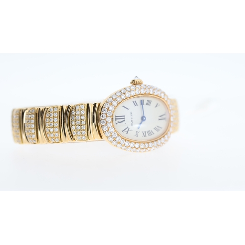 4 - Brand: Cartier
 Model Name: Baignoire 
 Reference: 2311
 Movement: Quartz
 Year: Circa 2010
 Box: Ac... 