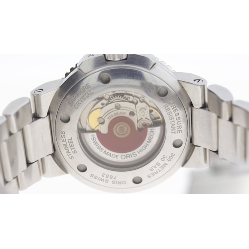 129 - Brand: Oris
 Model Name: Aquis 
 Reference: 7653
 Movement: Automatic
 Dial shape: Circular
 Dial co... 