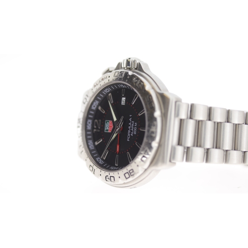 174 - Brand: Tag Heuer
 Model Name: Formula 1 Alarm 
 Reference: WAC111A
 Movement: Quartz
 Dial shape: Ci... 