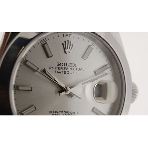 27 - Brand: Rolex
 Model Name: Datejust 41 
 Reference: 126300
 Movement: Automatic
 Year: 2018
 Box: Ful... 