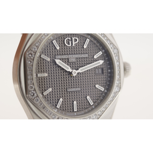 37 - Brand: Girard Perregaux
 Model Name: Laureato 
 Reference: 80189D11A231-11A
 Movement: Quartz
 Year:... 