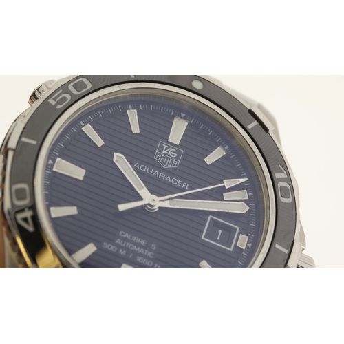 57 - Brand: Tag Heuer
 Model Name: Aquaracer 
 Reference: WAK2110
 Movement: Automatic
 Year: 2015
 Box: ... 