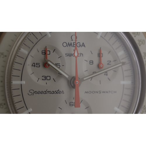 94 - Brand: Omega X Swatch
 Model Name: Moon Swatch 'Mission To Jupiter' 
 Movement: Quartz
 Year: 2022
 ... 