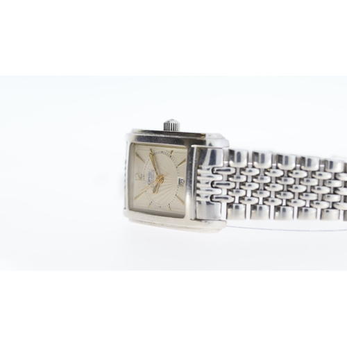 239 - Brand: Oris
 Model Name: Tank 
 Movement: Automatic
 Year: Circa 1990's
 Dial shape: Rectangular
 Di... 