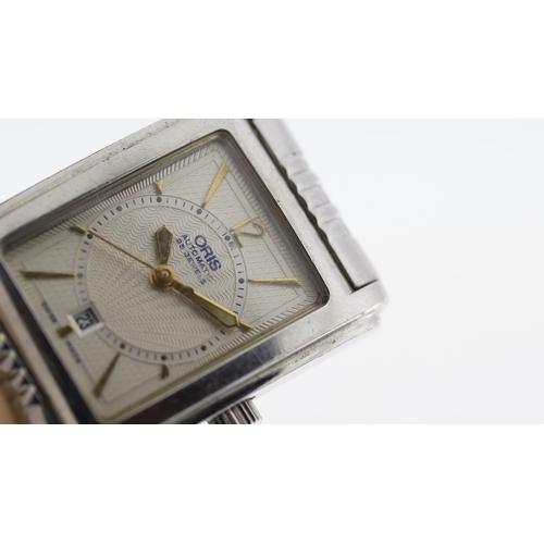 239 - Brand: Oris
 Model Name: Tank 
 Movement: Automatic
 Year: Circa 1990's
 Dial shape: Rectangular
 Di... 