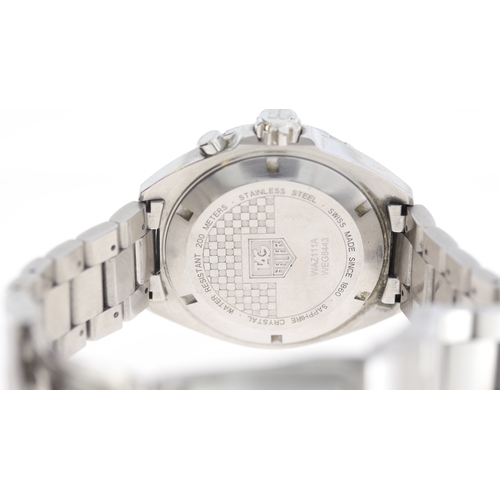 110 - Brand: Tag Heuer
 Model Name: Formula 1 Alarm 
 Reference: WAZ111A
 Movement: Quartz
 Dial shape: Ci... 