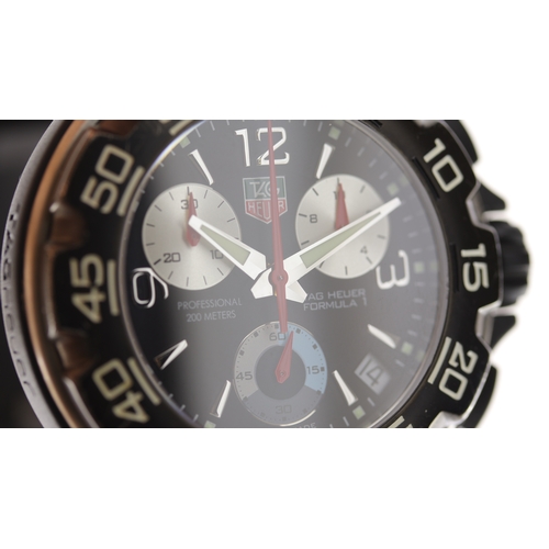 16 - Brand: Tag Heuer
 Model Name: Formula 1 
 Reference: CAC1110-0
 Movement: Quartz
 Box: Service box
 ... 