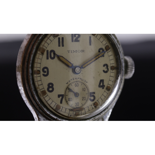 2 - Brand: Timor
 Model Name: Atp British Military 
 Movement: Manual Wind
 Dial shape: Circular
 Dial c... 