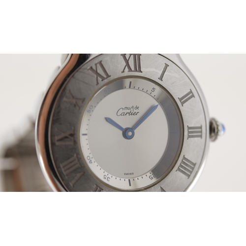 60 - Brand: Cartier
 Model Name: Must 21 De Cartier 
 Reference: 1330
 Movement: Quartz
 Dial shape: Circ... 