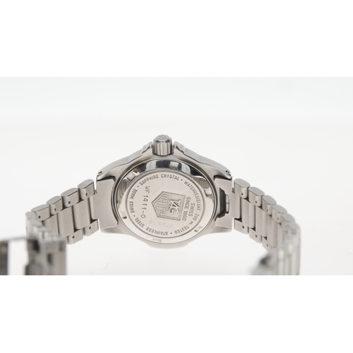 112 - Brand: Tag Heuer
 Model Name: Professional 4000 
 Reference: WF1411-0
 Movement: Quartz
 Box: Later ... 