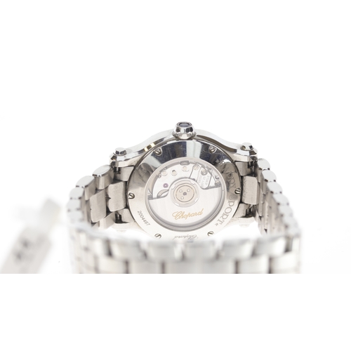 44 - Brand: Chopard
 Model Name: Happy Sport 
 Reference: 8573
 Movement: Automatic
 Dial shape: Circular... 