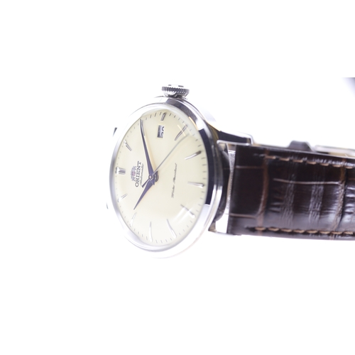 61 - Brand: Orient
 Model Name: Bambino 
 Reference: F672-UAT0
 Movement: Automatic
 Dial shape: Circular... 