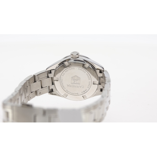 65 - Brand: Tag Heuer
 Model Name: Carerra 
 Reference: WV1411
 Movement: Quartz
 Box: Accompanying Box
 ... 