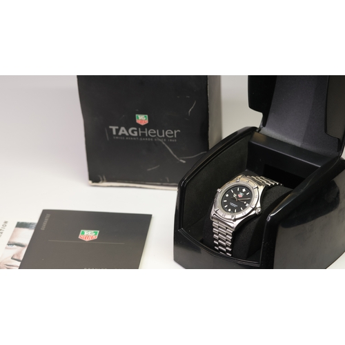 91 - Brand: Tag Heuer
 Model Name: Professional 
 Reference: 973.006
 Movement: Quartz
 Box: Accompanying... 