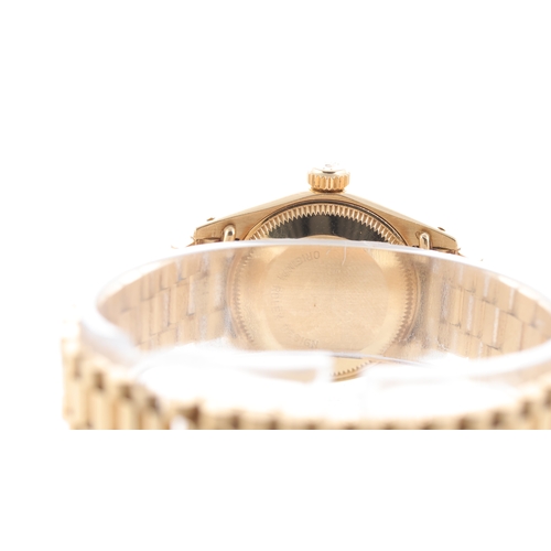 102 - Rolex Oyster Perpetual Date 18ct yellow gold Ref 6917 Circa 1983 Brand: Rolex
 Model Name: Oyster Pe... 