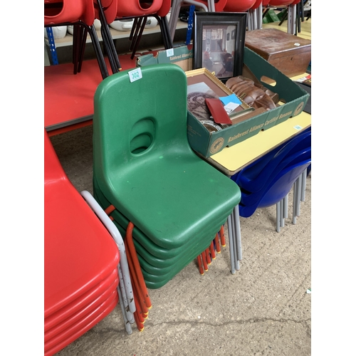 302 - stack green kids chairs