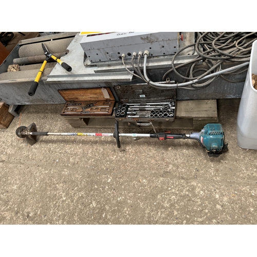 243 - Makita petrol strimmer