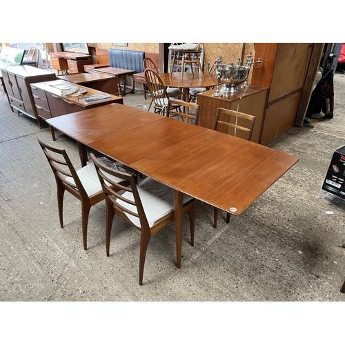 31 - Mid Century extending table and 4 ladder rack back chairs by McIntosh