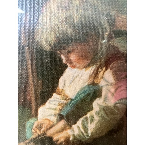 5 - framed picture of boy on a chair tying shoelace