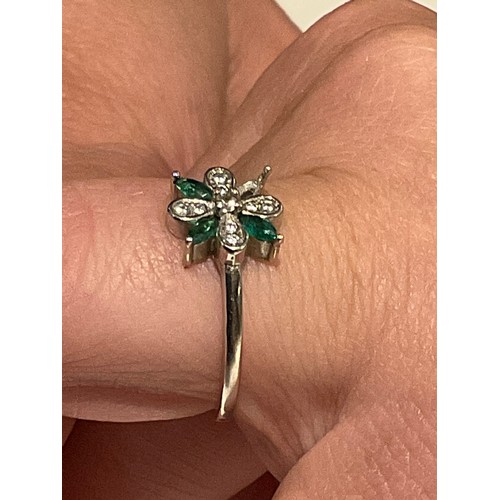 82 - Silver stamped 925 ring flower design 1.7 grams , green and clear stones one green stone missing... 