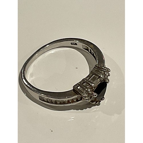 107 - 925 stamped silver ring triangle shaped with black centre stone surrounded with cz stones and cz sto... 