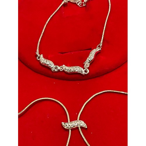 117 - necklace / bracelet and earring set in red case