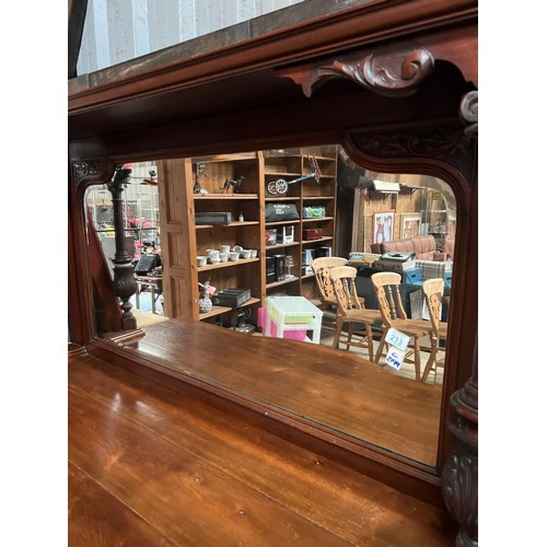 213 - ornate mirror back sideboard with carved panels to doors