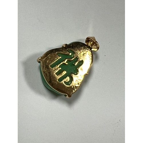 132 - gold plated faux jade Buddha pendant