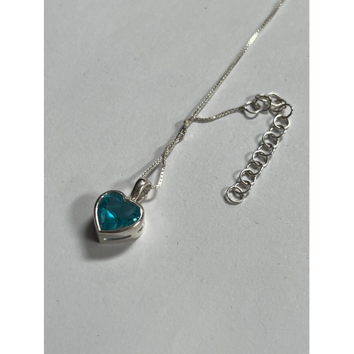 282 - silver necklace with blue topaz heart shape