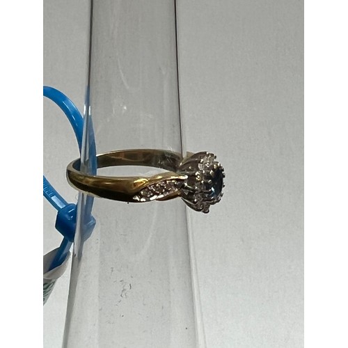 297 - 18ct gold cluster ring corn flower blue with diamonds 5.2 grams