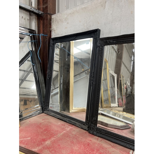 723 - black framed mirror