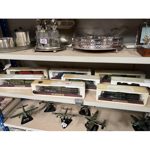 215 - Qty of models of trains on plinths