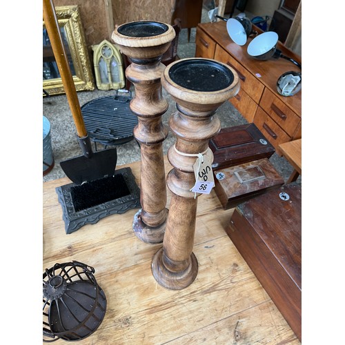 56 - pair tall wooden candle holders