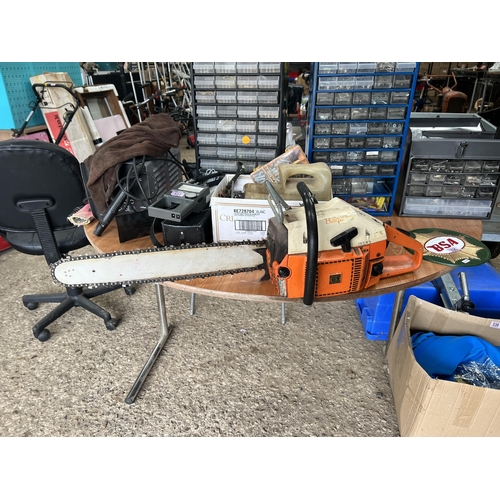 334 - Husqvarna petrol chainsaw plus accessories sold as seen hard to start needs service