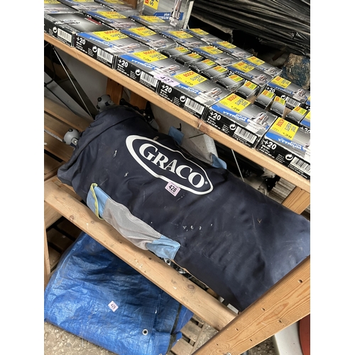 428 - folding travel cot in bag GRACO