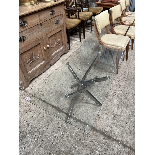 279 - glass top chrome leg coffee table 120cm x 60cm x 48cm