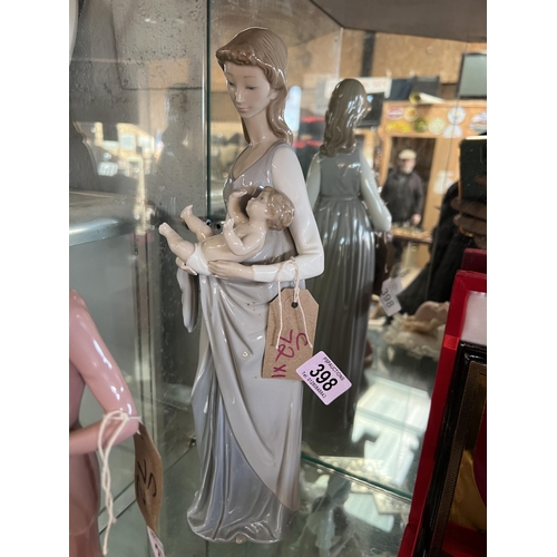 398 - Lladro lady holding baby