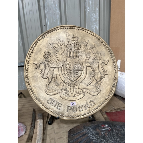 96 - large fibreglass one pound coin prop